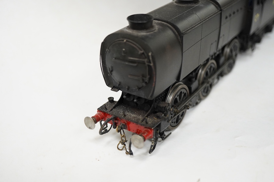 An 0 gauge kit built model railway locomotive by John Worsley, a Southern Railway Q1 class 0-6-0, C7, a highly detailed model with opening smoke box door showing the details of the blast pipe and boiler tube ends, sprung